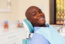 Man smiling during initial dental implant consultation
